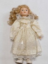BAMBOLA di PORCELLANA da