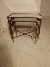 Tris tavolini in ottone e