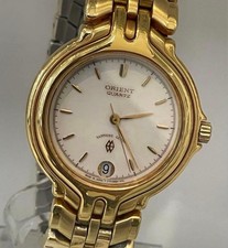 Orologio Orient placca elettrica oro 22 carati quarzo unisex vetro zaffiro raro