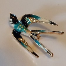 SPILLA AFFASCINANTE STILE ART DECO 'FLYING SWIFT'...