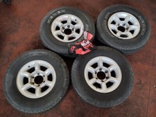 SsangYong N.4 CERCHI LEGA+GOMME 6 FORI 15" 7JJ 15 ET5 - 235 75 R15 109T/105S M+S