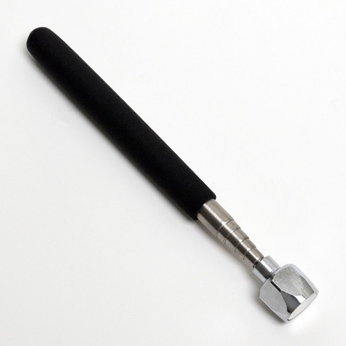 Strumento telescopico magnete