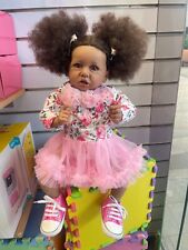 Bambola culturale realistica