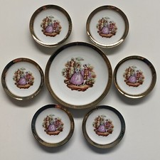 Servizio 6 piattini + piatto