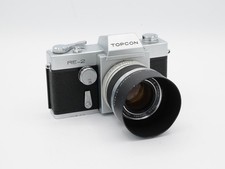 Topcon RE-2 fotocamera reflex 35 mm con obiettivo 58 mm F1.8 RE.Auto-Topcor e cappuccio