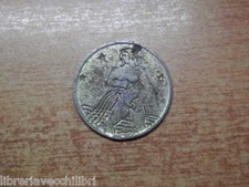 Vecchio gettone da sala giochi