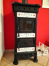 Stufa a legna in ghisa e maioliche usata