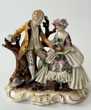 Antica statuina porcellana