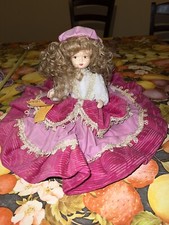 Bambola in porcellana da