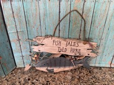 Insegna Pesce Legno Racconti