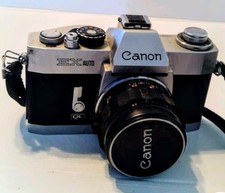 Canon EX AUTO QL con obiettivo