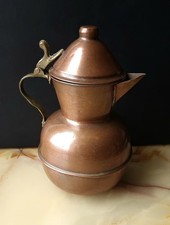 Antica brocca in rame da