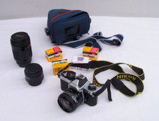 Nikon FM2 funzionante con 3 obiettivi: nikkor24 mm/nikkor70-210 mm e Sigma 52 mm