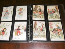 ALBUM RACCOGLITORE CON 40 CARTOLINE D'AUGURI D'EPOCA NON VIAGGIATE