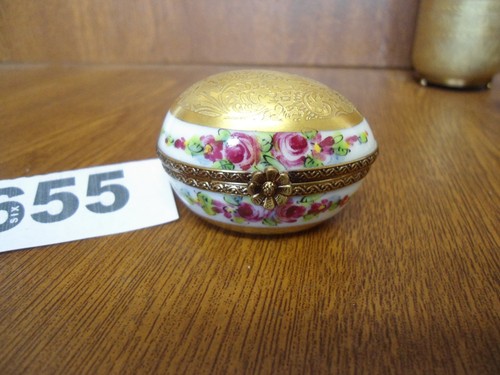 Gold encrusted egg shaped - encrusted,