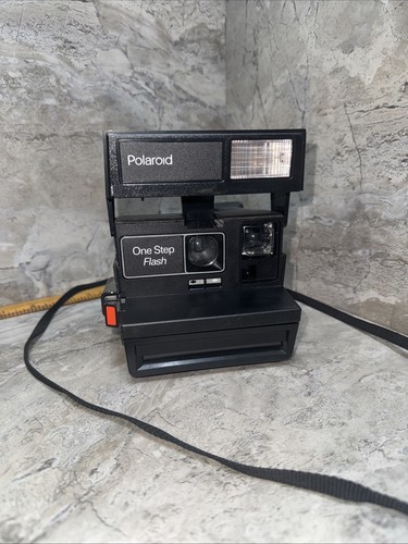 Polaroid one step - step, flash