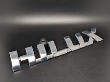 TOYOTA HILUX 218MM LOGO SIGLA EMBLEMA FREGIO STEMMA SCRITTA BADGE TARGA NOME