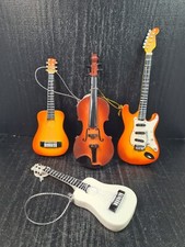 set 4 miniature strumenti