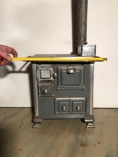  Stufa economica e stoviglie