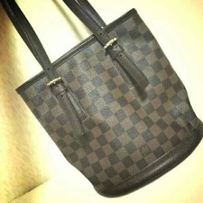 Vuitton Half  or Less