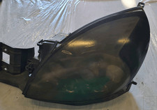 1091702 Proiettore SX FORD PUMA (CCE) 1.4 16V Cpè 3p/b/1388cc