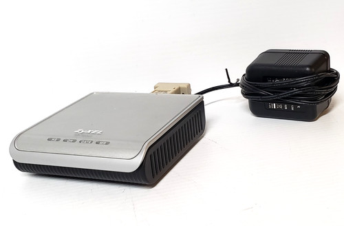 Zyxel omni 56k com - zyxel, modem