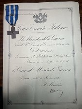 Diploma e croce al merito di