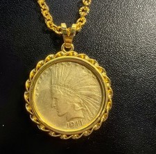 Ciondolo moneta testa di