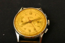 Orologio da polso cronografo Delbana 17J modello 320-8 cristallo ingiallito funziona brevemente