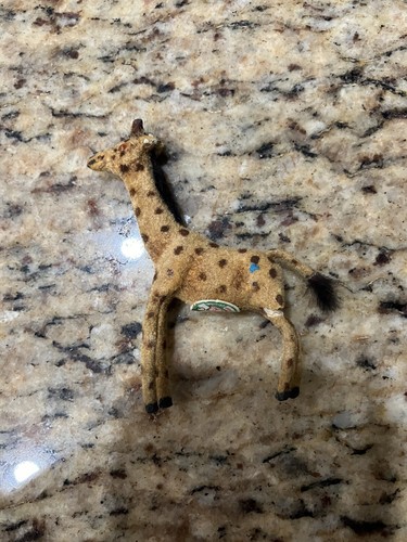 Giraffa floccata miniatura - in,