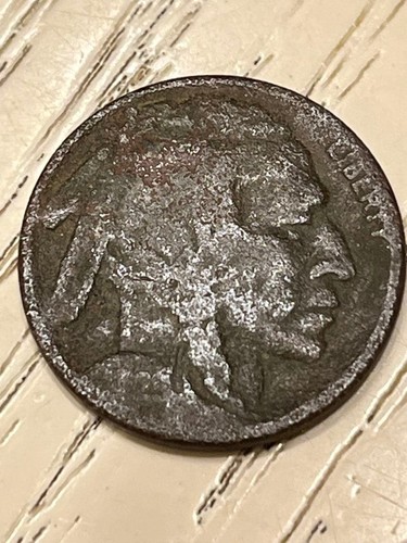 Moneta testa di - 5,