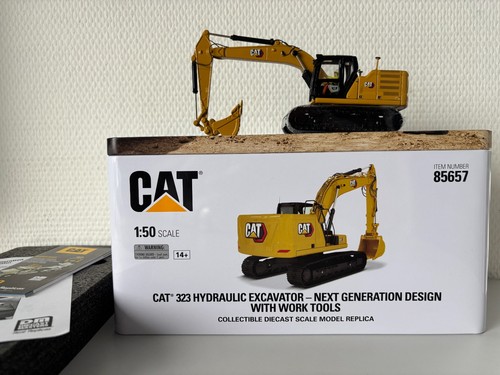 Caterpillar 323 escavatore - , a
