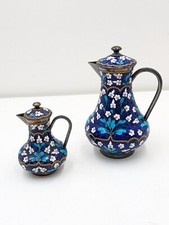 Coppia di teiere in argento