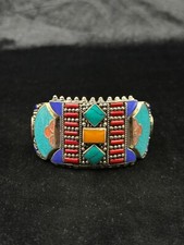 Bracciale vintage tibetano nepalese con ambra turchese e pietra corallo