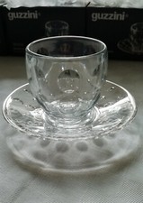 8 tazzine con piattino Guzzini Venice, materiale SMMA e vetro, 12xh1,9cm, 6,7x6