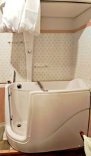 vasca da bagno con sportello  