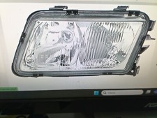 1EF963030281 right headlight