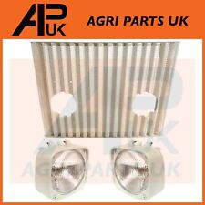 Griglia e fari per trattore