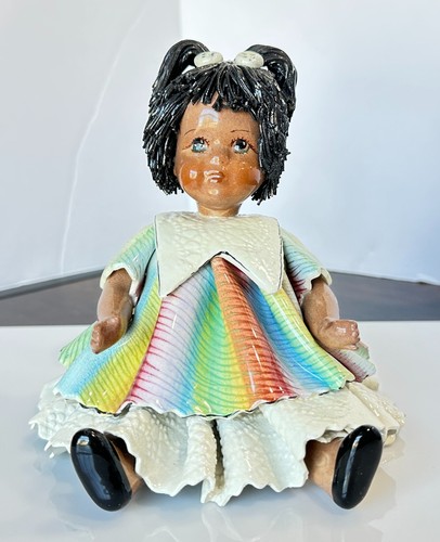 Statuina porcellana capelli