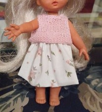 Gonna a fiori e top rosa per