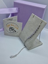 #58 - Bracciale Mezzo Tennis In Oro Bianco E Zaffiri Blu.