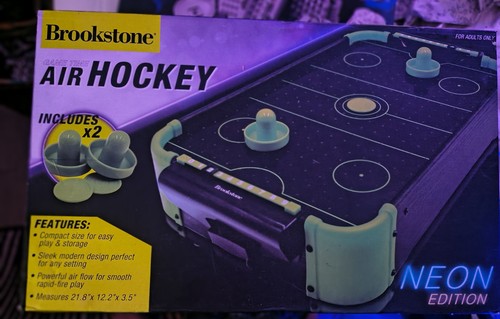 Tavolo air hockey brookstone - hockey,