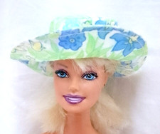 B1291 - BARBIE - KELLY 1994 cappello da pioggia cerato fiori celesti