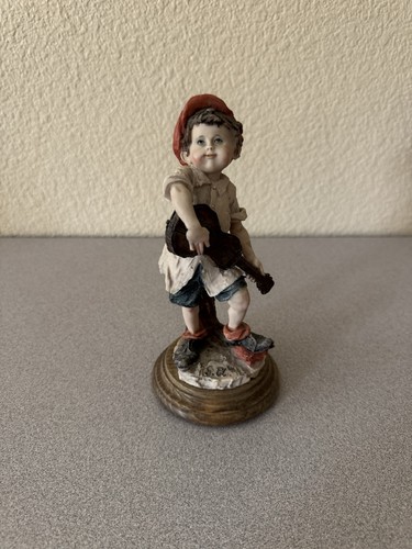 Statuina ragazzo violino