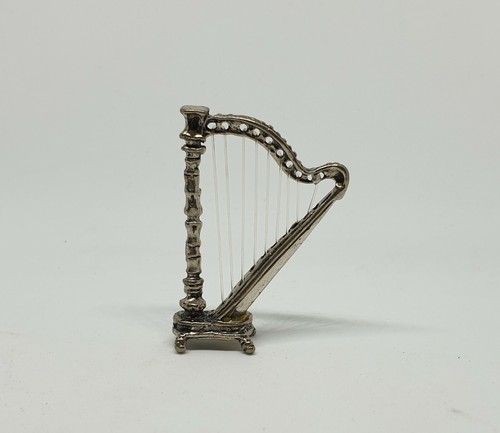 Miniatura oggettino argento - in,