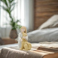 Statue angelo cane da