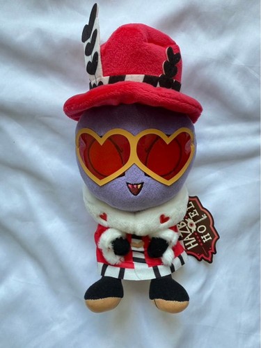 Peluche personaggio seduto
