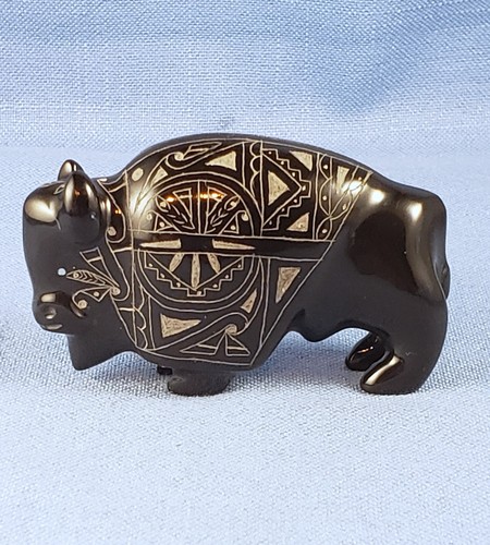 Buffalo fetish carved etched