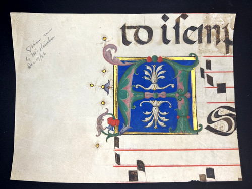 Iniziale illuminata da un - iniziale,