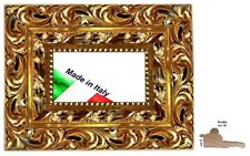 Cornice in legno oro anticata traforata per quadri,dipinti,stampe  Misura 70x100